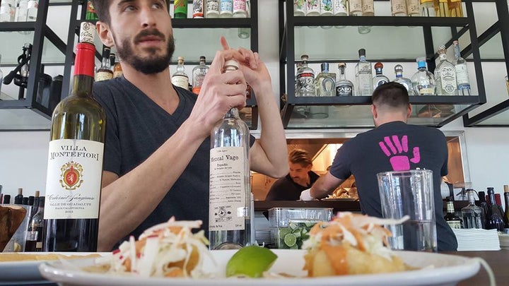 <p>David Axelrod explains the nuance of Mezcal at Pancito & Lefty’s</p>