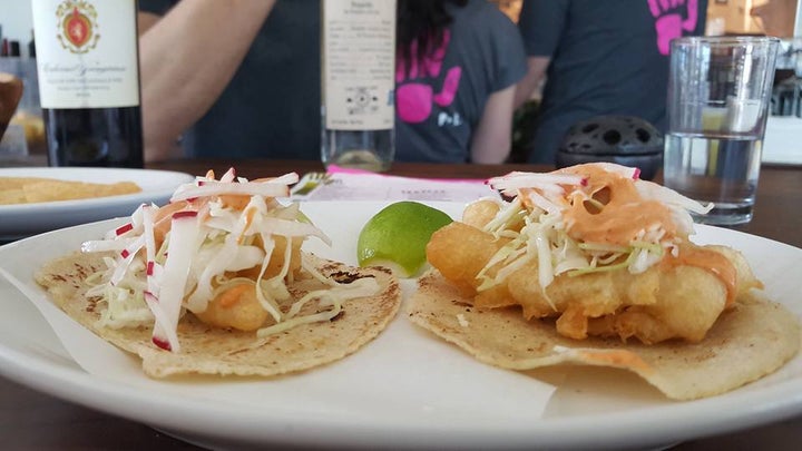 Fish Tacos with Pickled Cabbage, Chipotle Crema, and Lime at Pancito & Lefty’s