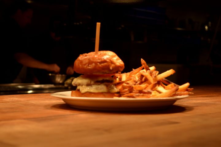 <p>Burger and fries at Edmund’s Oast</p>