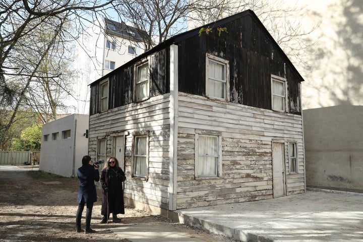 Rosa Parks' niece Rhea McCauley (right) stands outside her aunt's home, now in Berlin.