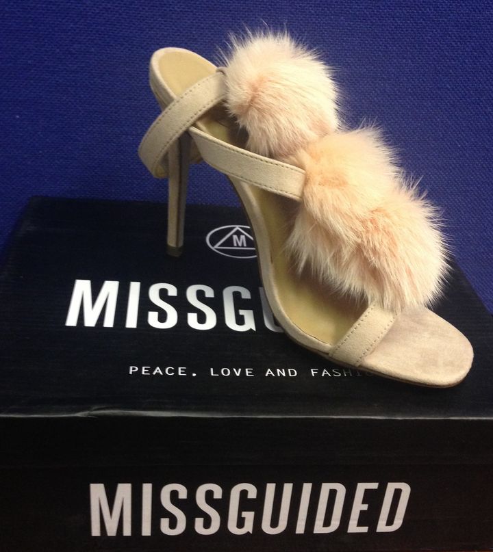Shoes by fur-free company Missguided purchased by HSI UK and tested positive for illegal cat fur. 