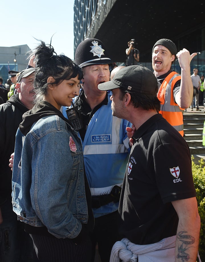 File photo dated 08/04/17 of Saffiyah Khan (left) staring down English Defence League (EDL) protester Ian Crossland during a demonstration in Birmingham, as she has said she was "not scared in the slightest" during the tense confrontation.