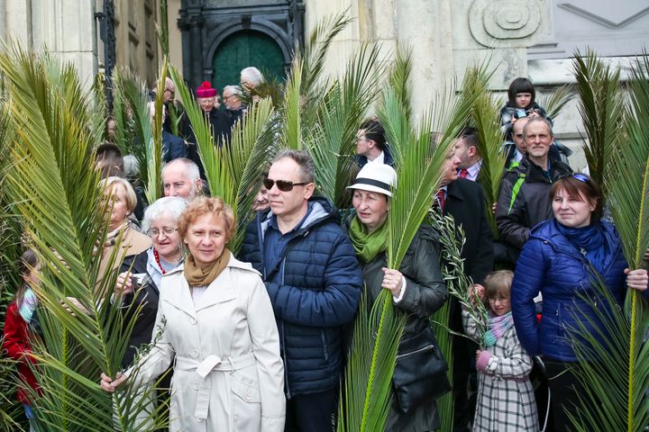 People attend a traditional Palm Sunday celebration on the first day of Holy Week