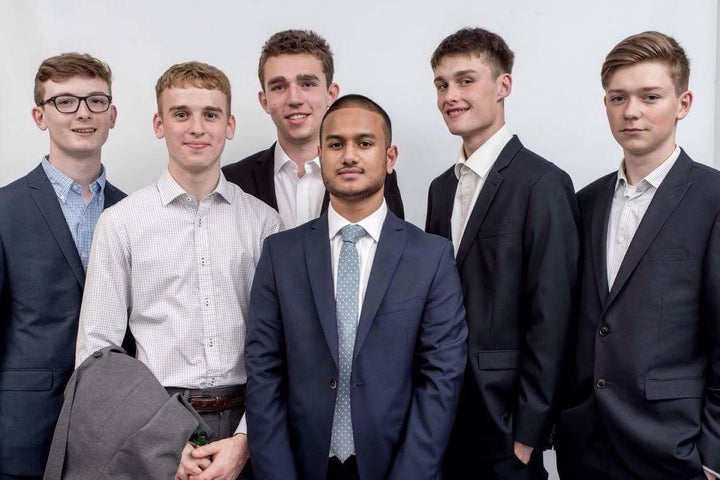 Hassan (centre) with friends. The Stoke Newington community has rallied behind his cause