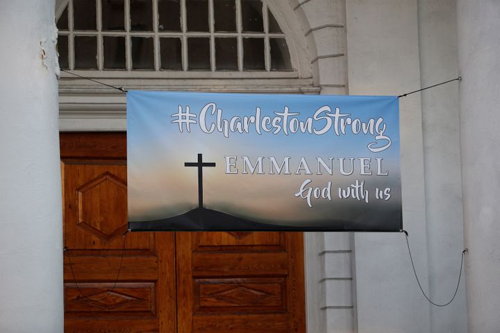 A Charleston Strong banner hangs from a church across from the Charleston Federal Courthouse during the federal trial of Dylann Roof who was found guilty of 33 counts including hate crimes in Charleston, South Carolina, December 15, 2016. (REUTERS/Randall Hill)