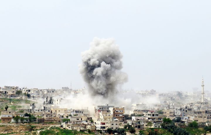 Smoke rises after Syrian Regime Forces bombed the Menshiyye neighborhood as opposition forces advance towards the center of Daraa, Syria on April 10, 2017.