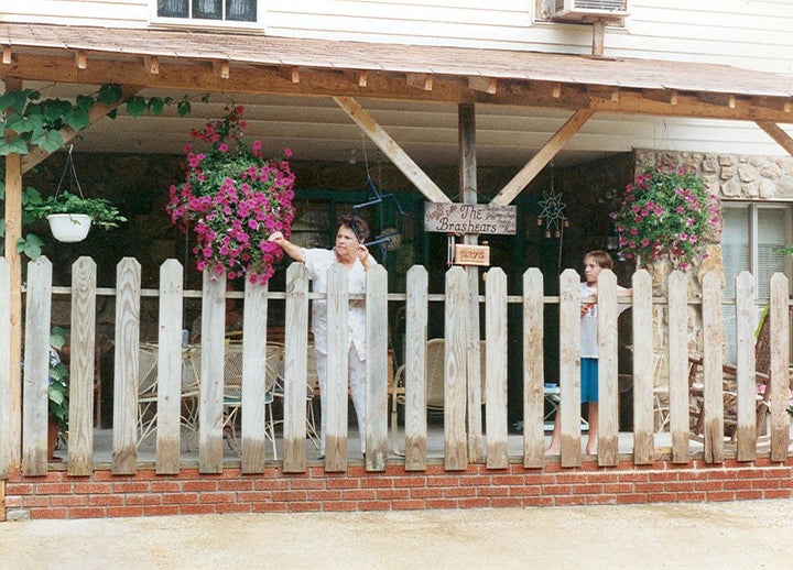Me, with my Granny Della, on her porch.