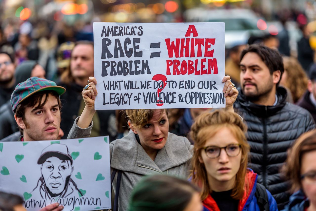 People gather in New York on March 24, 2017, to honor Timothy Caughman and other victims of hate crimes, and to say no to domestic terrorism. Caughman was stabbed to death in a racist hate crime.