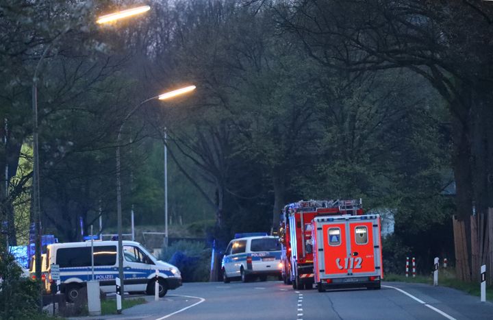 Police and emergency vehicles are seen after the explosion