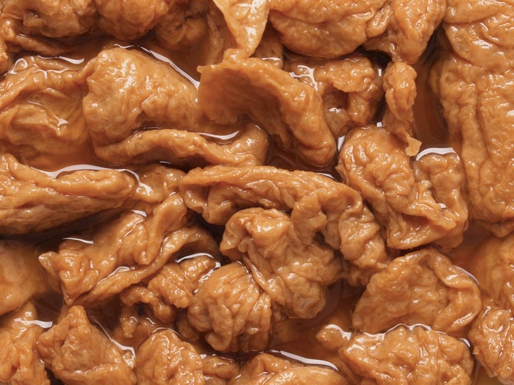 A close-up of a bowl of seitan.