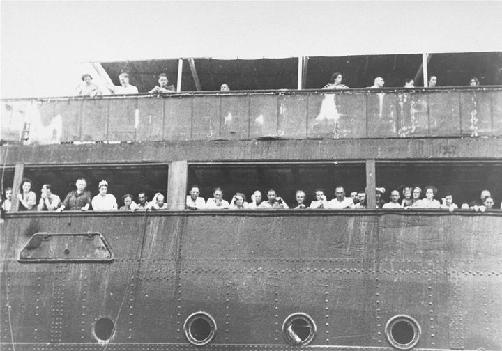 Jewish refugees aboard the St. Louis attempt to communicate with friends and relatives in Cuba, who were permitted to approach the docked vessel in small boats. The passengers were not allowed to disembark.