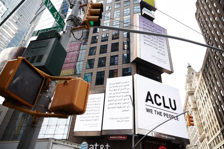 An ACLU billboard in Times Square features the First Amendment in Arabic.