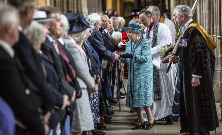 The Queen distributing Maundy money at St George's Chapel, Windsor Castle, last year