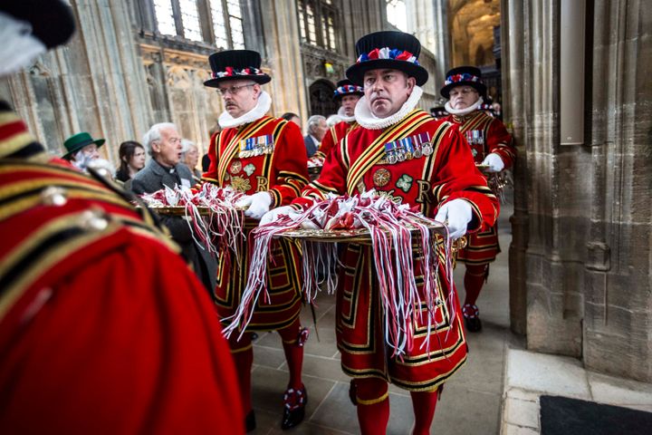 Yeoman warders carry trays containing the Royal Maundy money