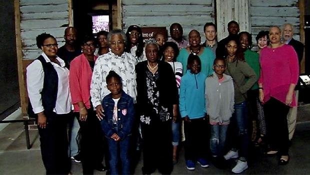 Isabell Meggett Lucas, center, and her family visit the Museum of African American History.