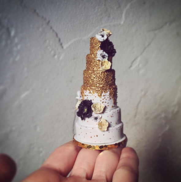 This gold wedding cake miniature took 12 hours to create.