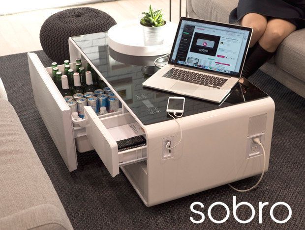 Besides a fridge, the table boasts charging outlets, Bluetooth capabilities and speakers. 
