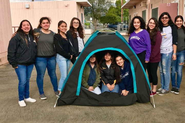 The girls of San Fernando High School with a prototype of their invention. 