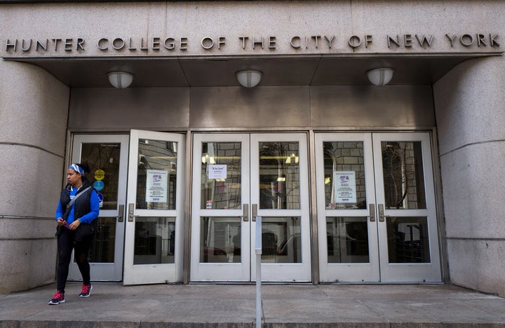 A student exits a building on the campus of Hunter College of The City University of New York on April 10.