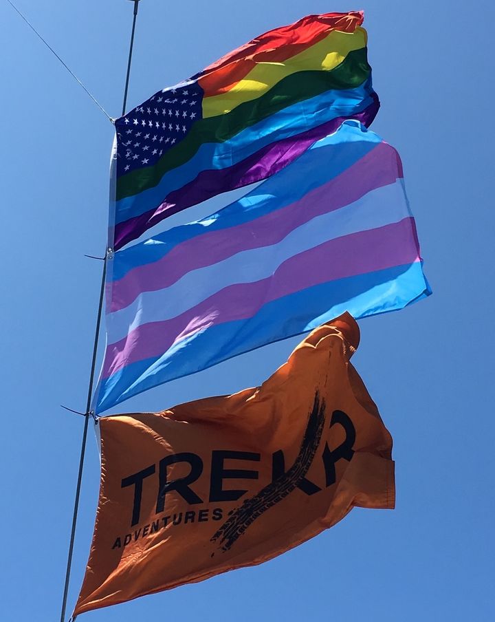 The gay pride flag, the Trans pride flag and the Trekr flag above the boat we raced in the 2017 BVI Spring Regatta.