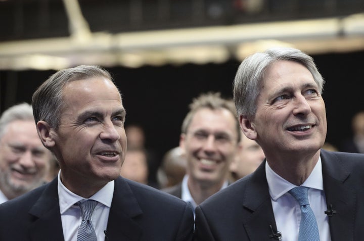 <strong>Philip Hammond and Mark Carney watched on as Hinrikus delivered his speech</strong>