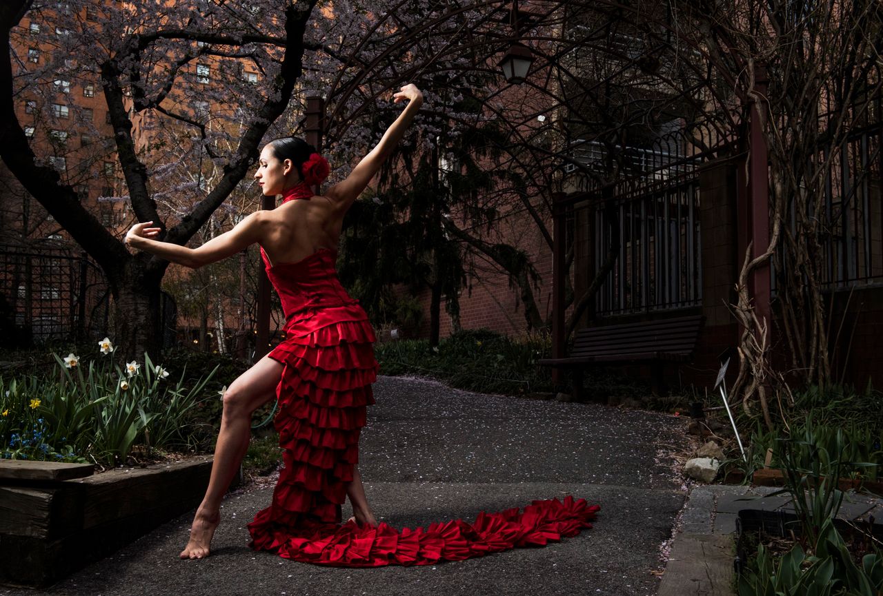 Ballet Hispánico dancer Melissa Fernandez, from Miami, Florida, poses in a community garden in Manhattan's Upper West Side.