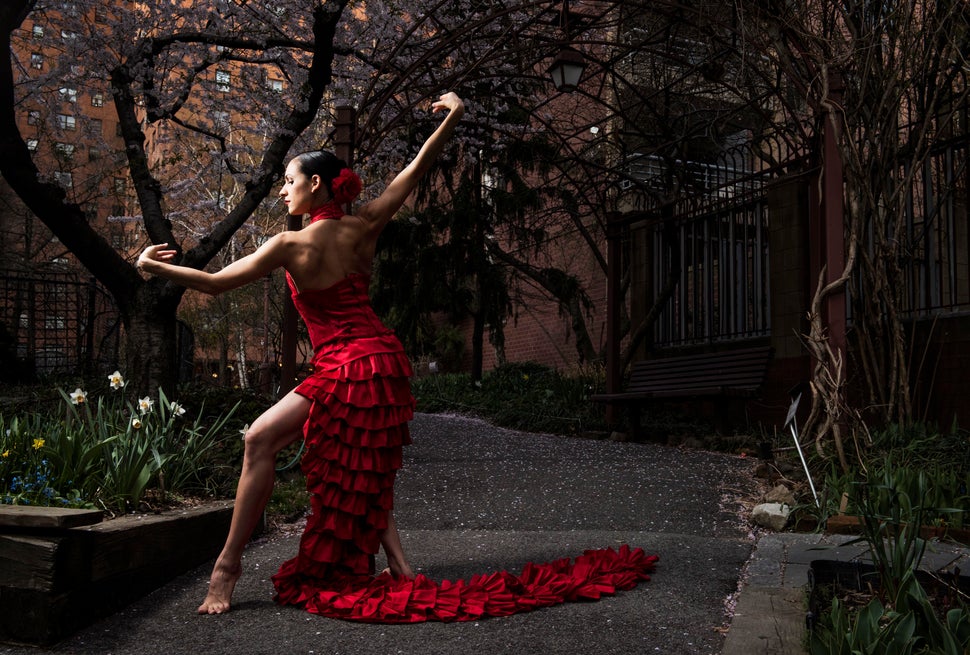 Ballet Hispánico dancer Melissa Fernandez, from Miami, Florida, poses in a community garden in Manhattan's Upper West