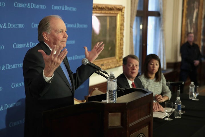 Attorneys Thomas Demetrio, left, and Stephen Golan, center, hold a press conference with Crystal Dao Pepper, the daughter of Dr. David Dao, on April 13 in Chicago.