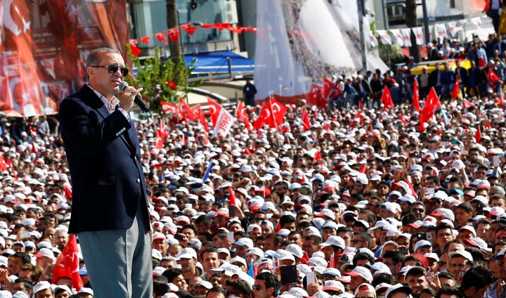 Turkish President Tayyip Erdogan addresses his supporters in Izmir, Turkey, during a rally for the upcoming referendum on April 9.