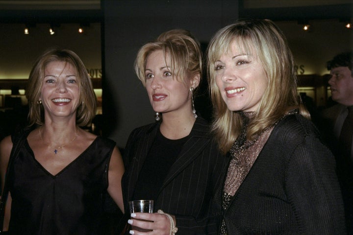 Kate Bohner (center) with Candice Bushnell and Kim Cattrall at a party years after the Lewis column.