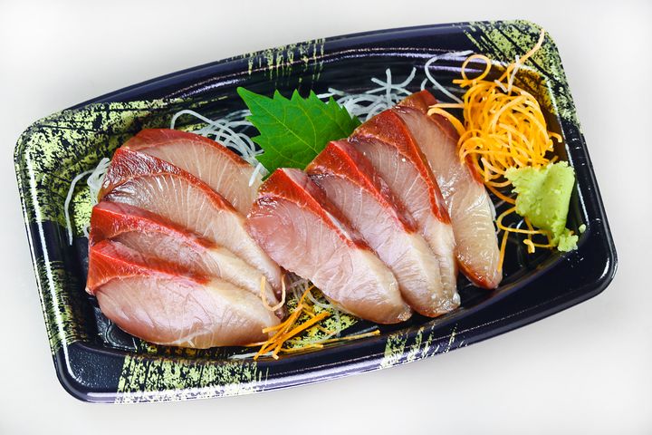 Shiso often serves as decoration on sushi platters.