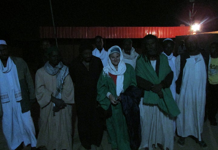 <p>Night-time Sufi caravan in Sudan</p>
