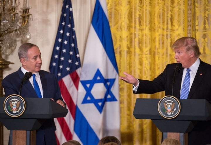 Donald Trump and Benjamin Netanyahu hold a joint press conference in the White House on February 15