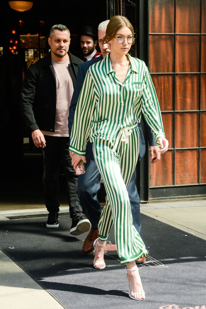 In April, Hadid left a New York City hotel wearing a green PJ set and heeled sandals.