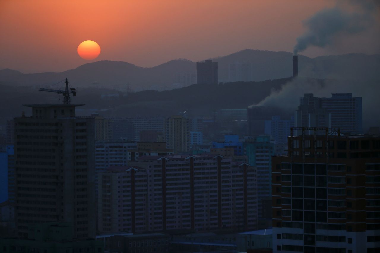 The sun sets in Pyongyang, April 12, 2017.