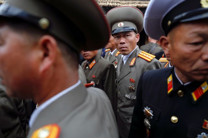 Military officers visit the birthplace of North Korean founder Kim Il Sung, a day before the 105th anniversary of his birth, in Mangyongdae, just outside Pyongyang, North Korea, on April 14.