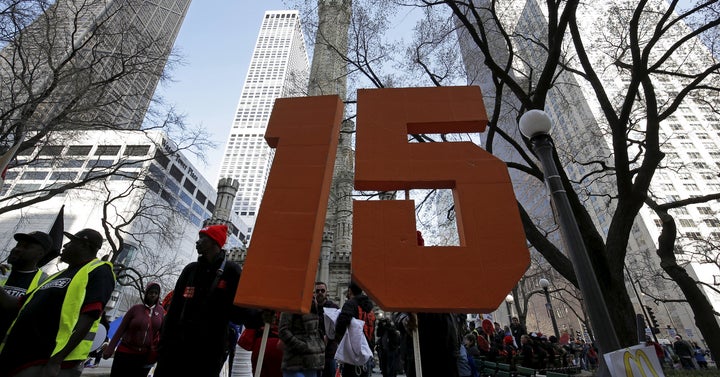 Demonstrators gather for a protest calling for a $15-an-hour nationwide minimum wage in downtown Chicago, Illinois, United States, April 14, 2016.