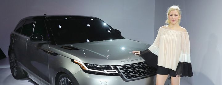 Pop balladeer Ellie Goulding rests a hand on a new Range Rover Velar. photo: Jaguar Land Rover