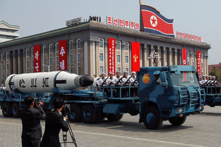 Military vehicles carry missiles with characters reading 'Pukkuksong' during a military parade marking the 105th birth anniversary of country's founding father, Kim Il Sung in Pyongyang, April 15, 2017. 