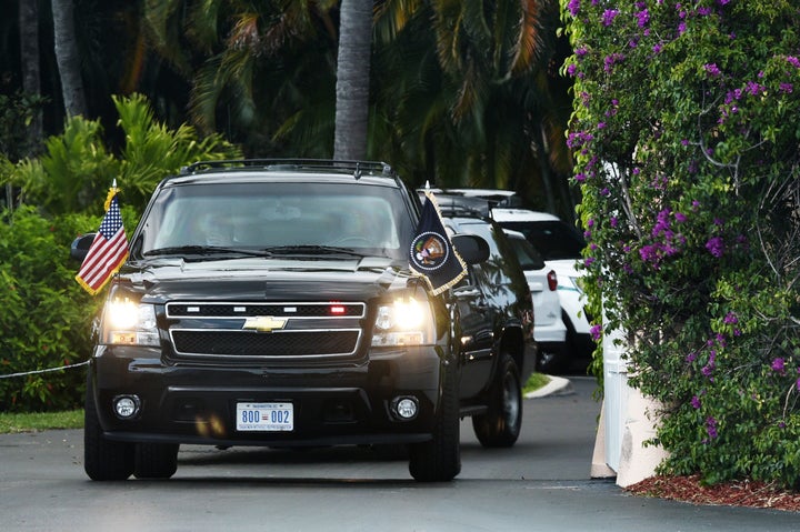 The motorcade carrying President Donald Trump pulls out of his Mar-a-Lago estate on March 19, 2017.