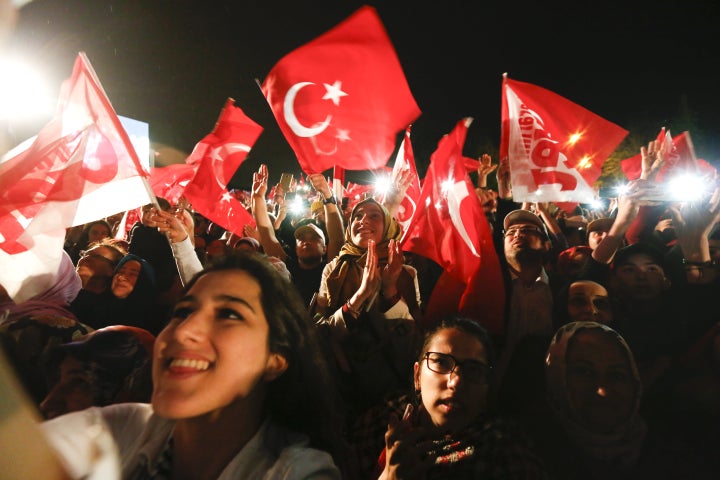 Supporters of Turkish President Tayyip Erdogan celebrate in Istanbul, Turkey, April 16, 2017.