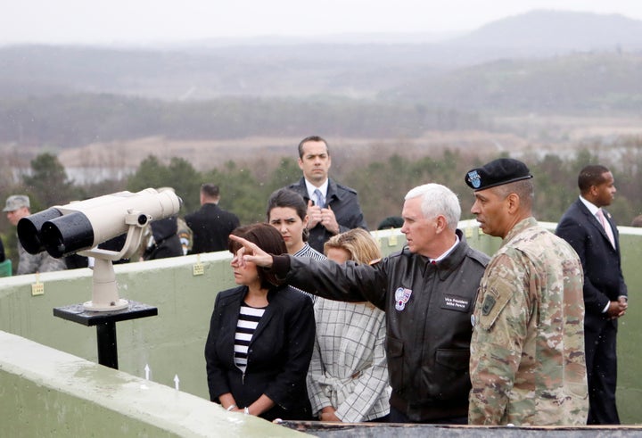 Vice President Mike Pence looks toward the north from an observation post inside the demilitarized zone separating the two Ko