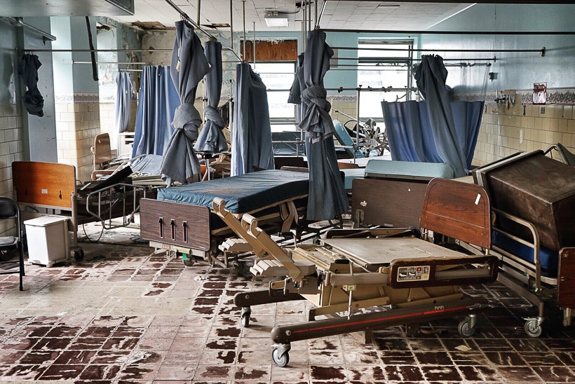 why is new orleans charity hospital still abandoned 12 years after