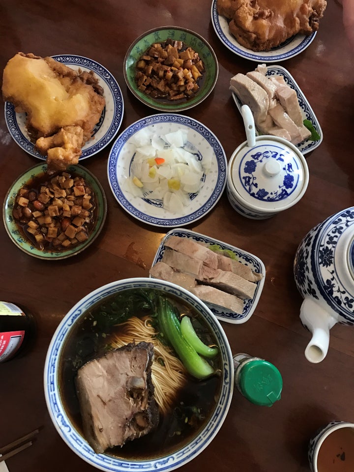 Aozao noodles with a bevy of accompaniments: duck, pork belly, radish, pork cutlet.