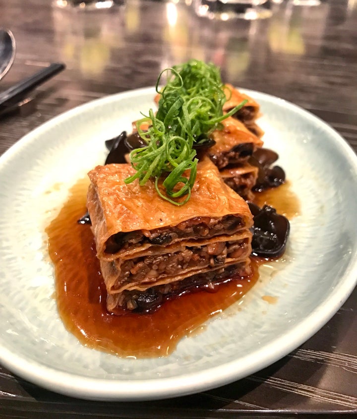 Braised Bean Curd stuffed with mushrooms.