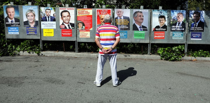 Campaign posters of the 11 candidates in the French election. Left, right and centre can seem pretty blurred in 2017 France.