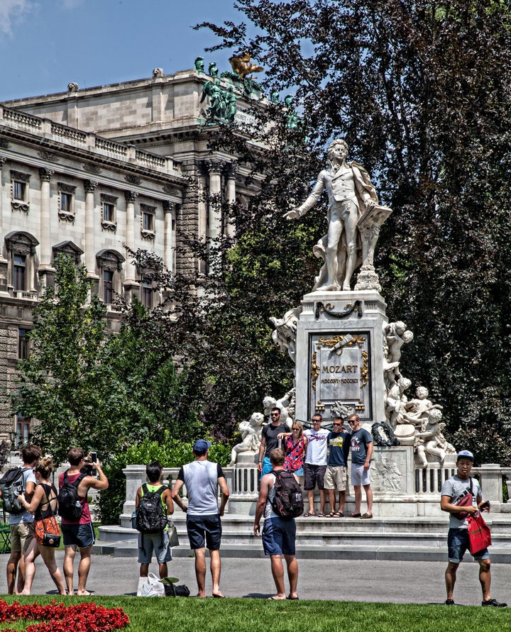 <p>As everywhere in Austria, Mozart is a hero. Put him on a pedestal, surround him with green grass and a set of steps, and they will come. A photo op in Vienna, Austria. </p>