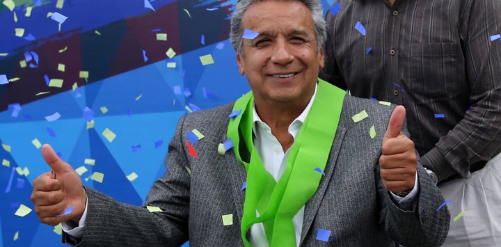 Lenin Moreno celebrates after Ecuador’s election board said he won the country’s presidential election.