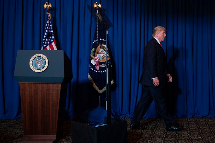 President Donald Trump departs after delivering a statement on Syria from the Mar-a-Lago estate in West Palm Beach, Florida, on April 6. The president has talked tough when it comes to foreign policy, but so far appears to be acting based on policies similar to that of his predecessor.