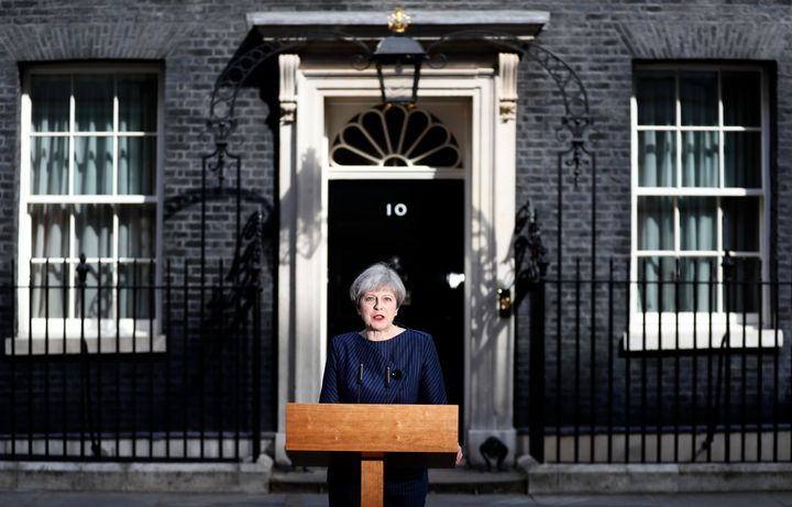 Britain's Prime Minister Theresa May speaks to the media outside 10 Downing Street, in central London, Britain April 18, 2017.
